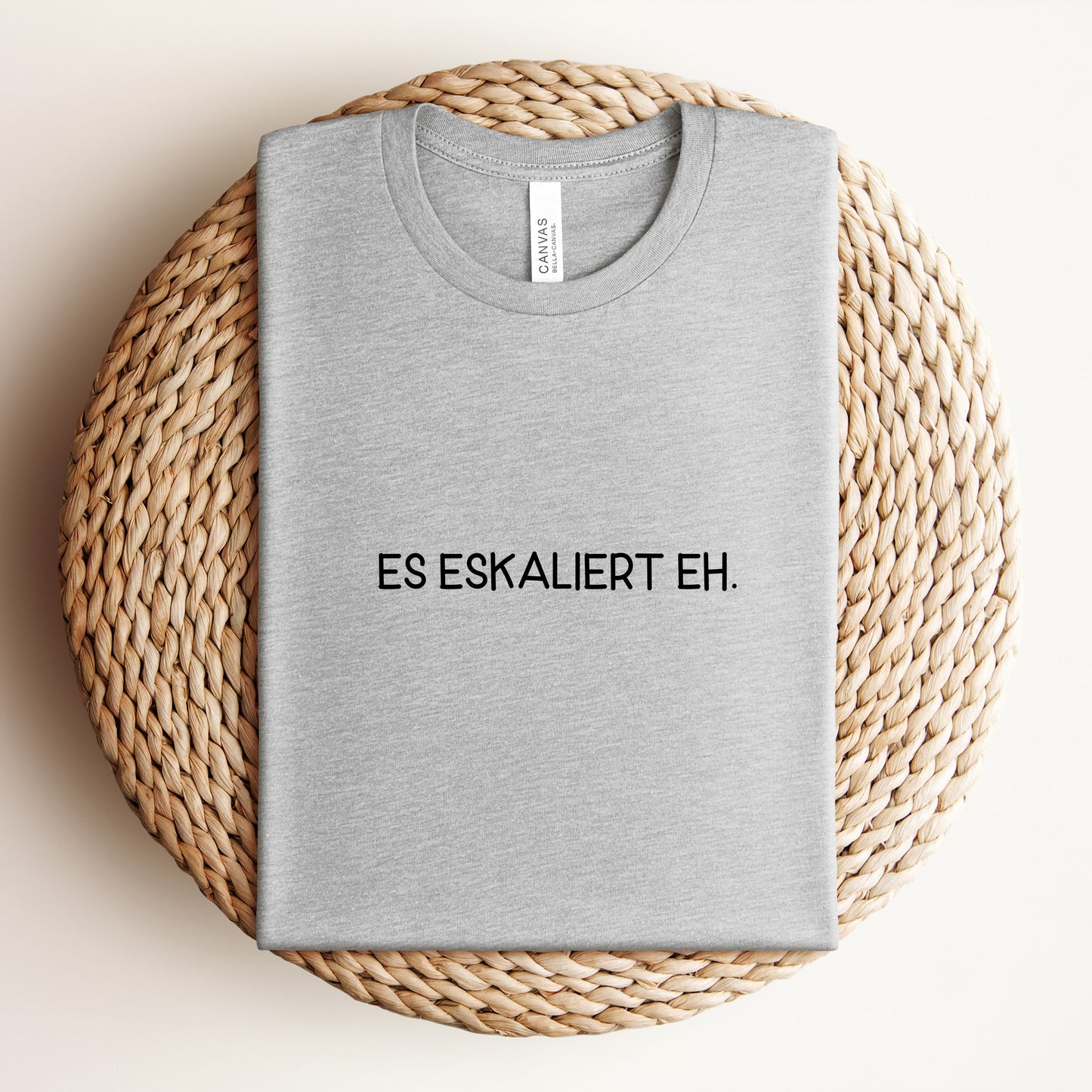 Es eskaliert eh. - Unisex Shirt