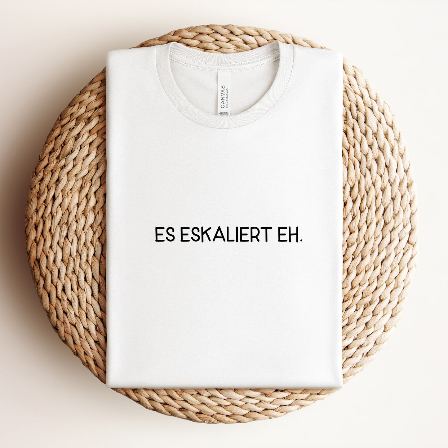 Es eskaliert eh. - Unisex Shirt